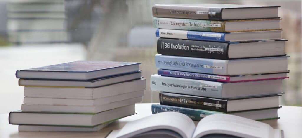 Best Books on Writing Fiction or Nonfiction blog post featured images stack of books