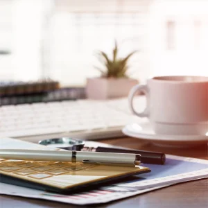 A calculator on a desk.