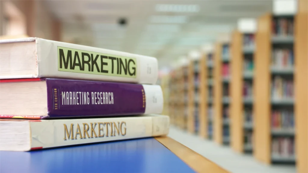 Why Book Marketing Requires a Specialized Approach A specialized stack of marketing books.